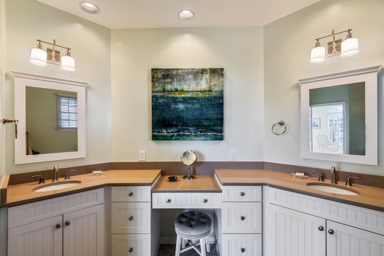 Your private bathroom features double vanities, generous countertop space, and a dedicated vanity area—perfect for getting ready in comfort and style.