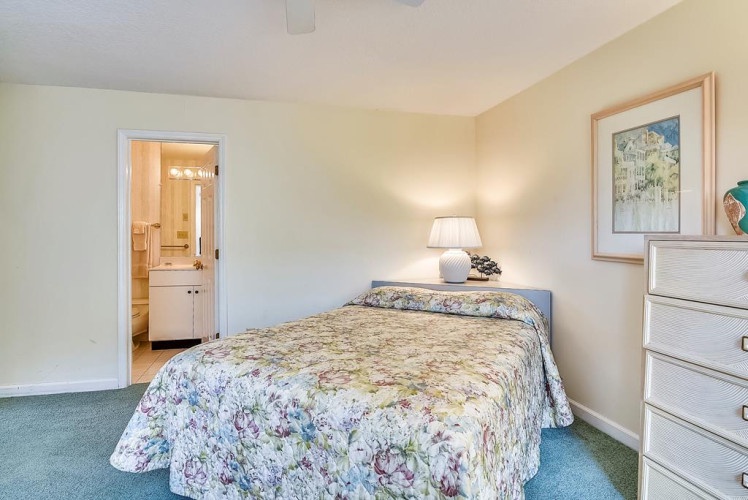 Relax in your private bedroom with soft lighting and an ensuite bathroom just steps away—everything you need for a restful night.