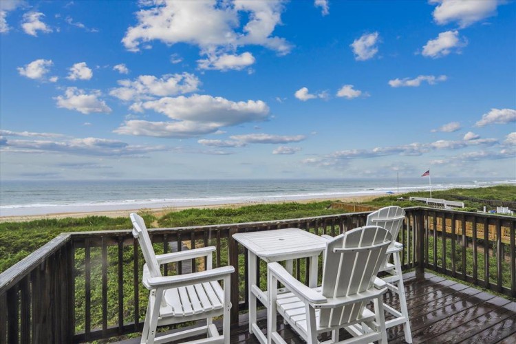 Settle into your private deck chairs and soak in stunning ocean views with the calming sound of waves rolling in. Your coastal retreat awaits just steps from the sand.