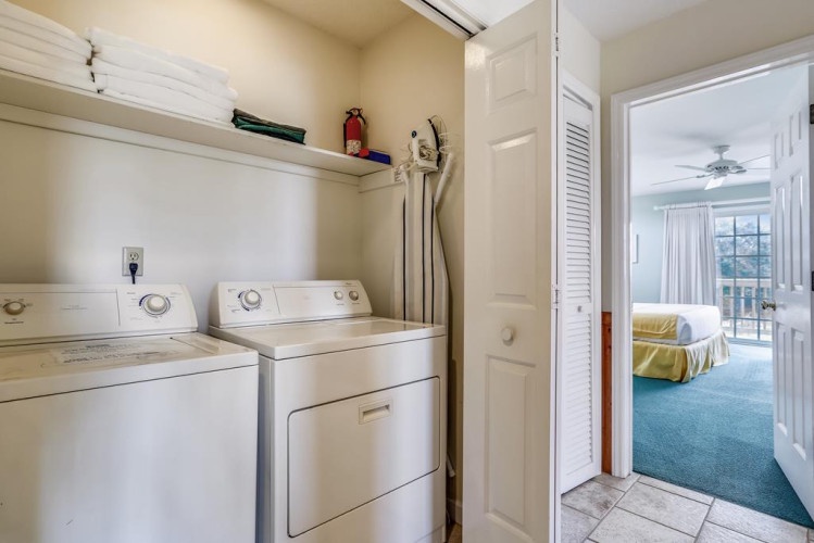 Your own in-unit laundry closet keeps your vacation wardrobe fresh, with a full washer and dryer plus shelving for linens and supplies.