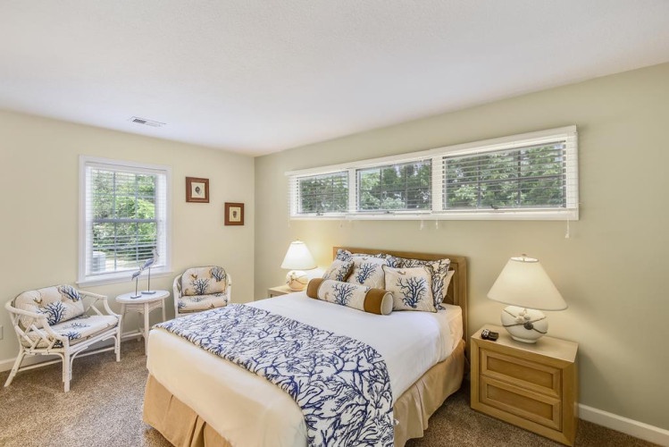 Relax in your sunlit retreat with coastal charm and peaceful garden views—your perfect escape awaits.