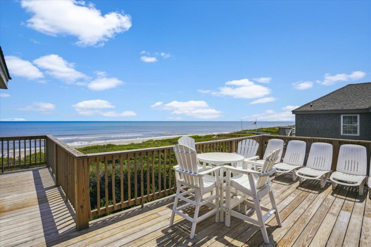 Breathe in the fresh ocean air and picture yourself relaxing in this peaceful oceanfront setting. Soak up stunning coastal vistas from your private deck—ideal for morning coffee or sunset gatherings.