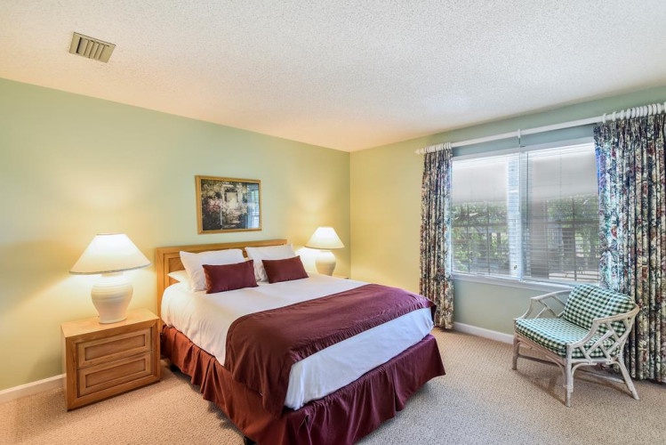 Wake up refreshed in your serene bedroom, where soft natural light and cheerful colors create a calming retreat after a day of adventure.