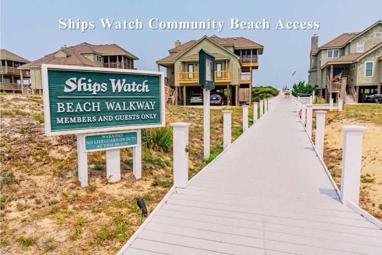 Ships Watch Community Beach Access offers a private boardwalk leading to the shore. Elevated coastal homes surround the walkway, with ocean breezes and beach days just steps away.