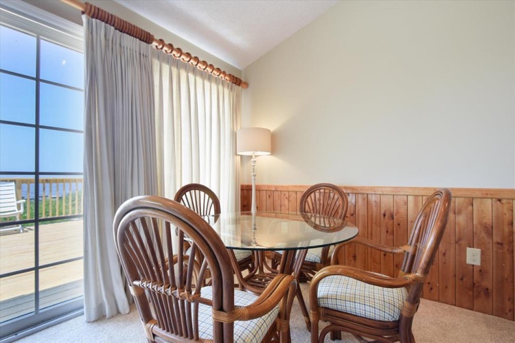 Gather for meals around your intimate dining table, where glimpses of the ocean and fresh coastal air await just beyond your private balcony.