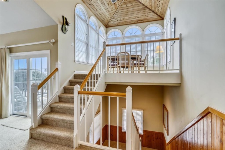 You'll love the soaring ceilings and bright, open layout that fills this space with natural light—perfect for gathering with family or simply enjoying the airy, welcoming atmosphere.