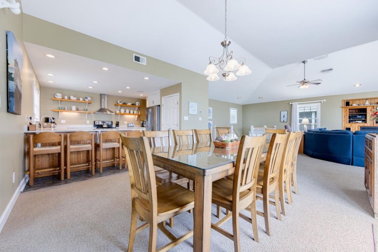 Your spacious kitchen and dining area invites everyone to gather, cook together, and share meals around the generous table—perfect for making memories with family and friends.