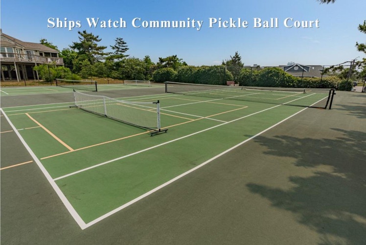 Challenge your friends to a friendly match on the community pickleball court, nestled among trees and just steps from your rental. Perfect for staying active while you vacation.