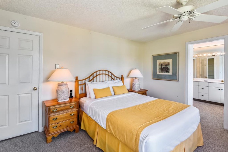 Unwind in your bright bedroom with a comfy bed, warm lighting, and your own ensuite bathroom just steps away—your perfect retreat after a day exploring.
