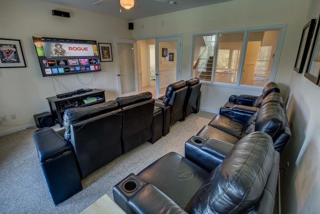 Settle into your own private cinema with plush recliners and a large-screen entertainment setup. Perfect for movie nights or catching up on your favorite shows in total comfort.