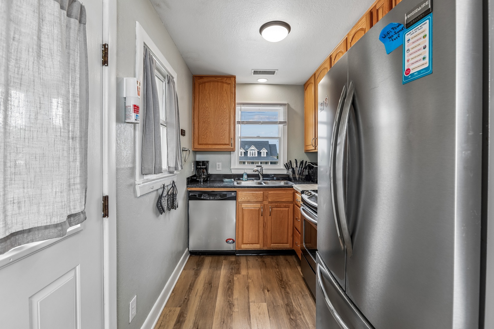 Step into your fully equipped kitchen, complete with modern stainless steel appliances and all the essentials you need to prepare your favorite meals during your stay.
