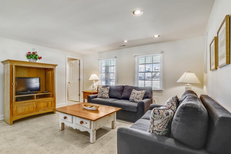 Unwind in your cozy living room with plush seating, ambient lighting, and entertainment ready. Perfect for relaxing evenings with family or friends after a day of adventure.