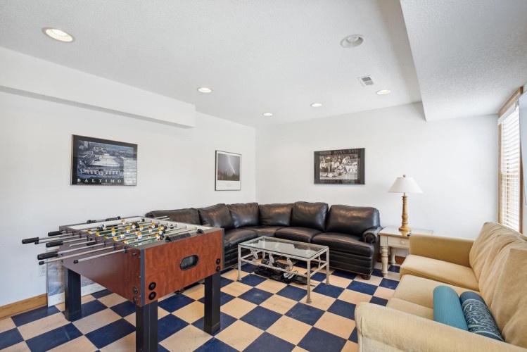 Unwind in this bright game room with foosball and plenty of seating—perfect for friendly competition and relaxing with loved ones after a day of exploring.