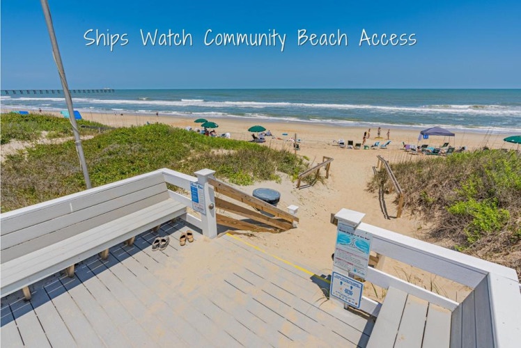 Community beach access at Ships Watch leads you straight to golden sands and rolling waves—just steps from your vacation retreat.