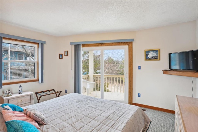Wake up in your bright, comfortable bedroom with natural light streaming through the windows and step out onto your private balcony to greet the day in a peaceful neighborhood setting.