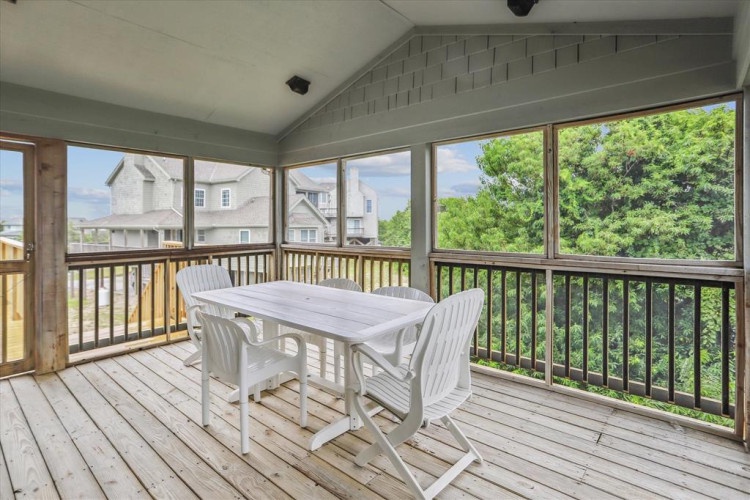 Your screened-in porch offers fresh air and peaceful views—perfect for morning coffee or outdoor dining, all while staying protected from the elements.