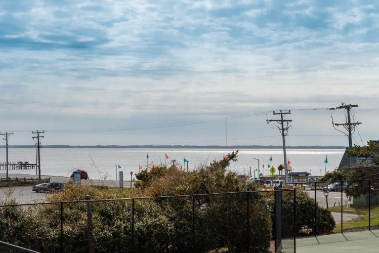 Waterfront location offering easy access to the bay and local attractions, visible from the property surroundings.
