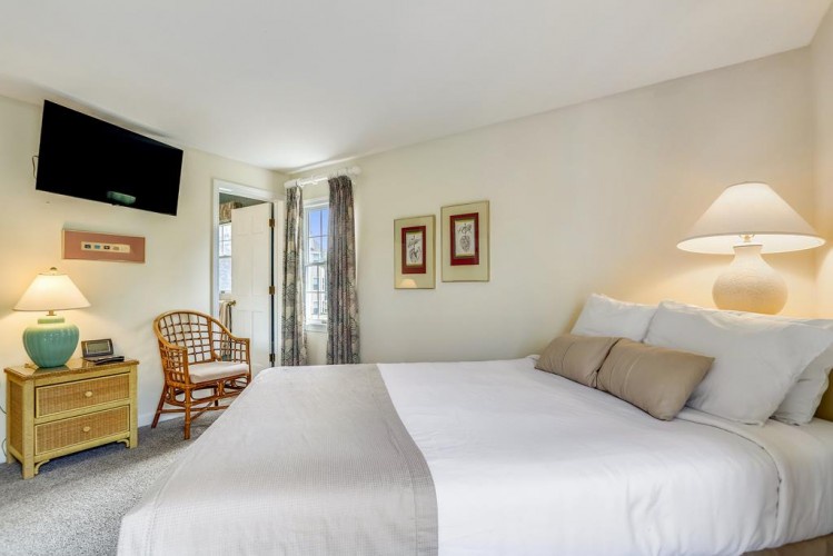 Your tranquil retreat awaits with plush bedding, soft ambient lighting, and thoughtful décor. Unwind in the rocking chair or catch a show on the wall-mounted TV.