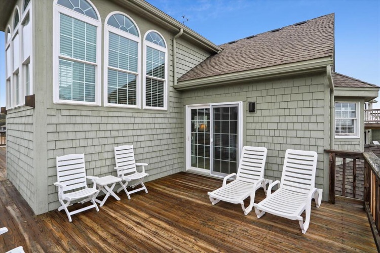 Stretch out on your private deck with four lounge chairs, perfect for soaking up sunshine or catching the breeze with a good book.