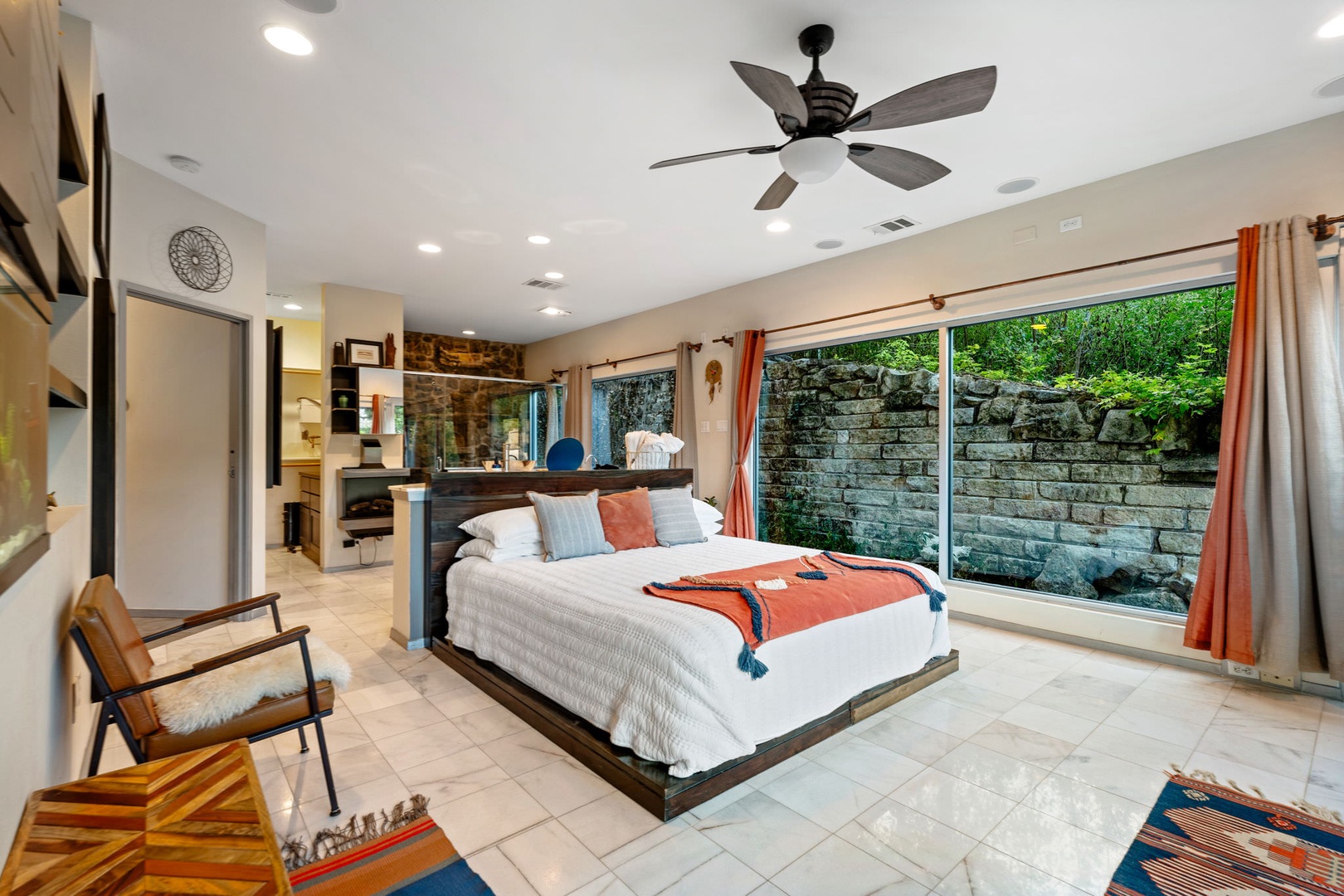 Bedroom 1 with King bed, Smart TV, deck access, and open en-suite