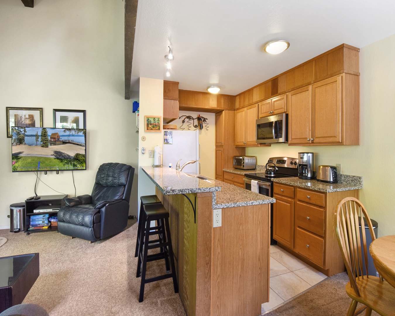 Kitchen with drip coffee pot, toaster, toaster oven, and more