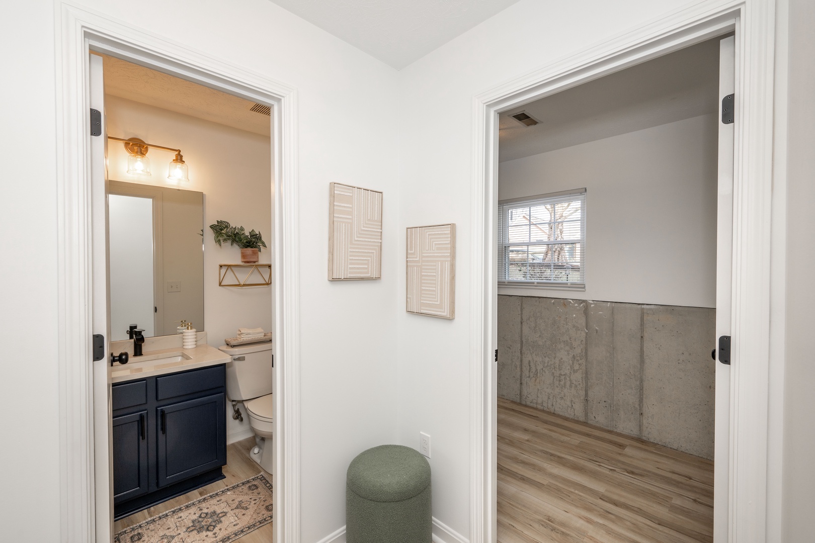 A convenient half bath & private laundry await on the lower level