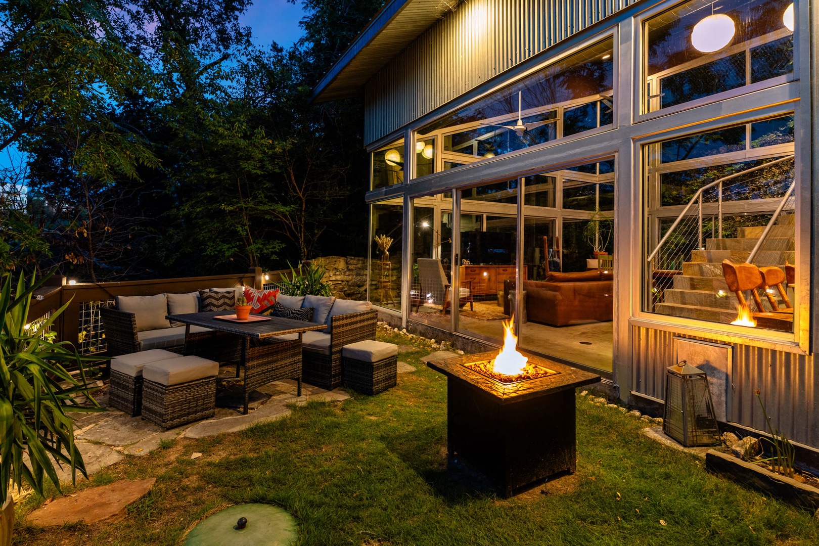 Large back deck with outdoor seating, fire pit and endless views