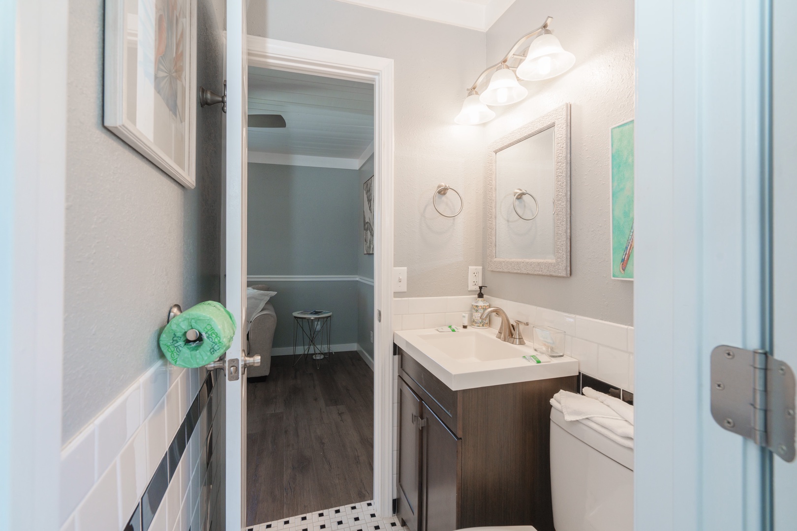 Half Bath attached to Bedroom #1 and the Living Room