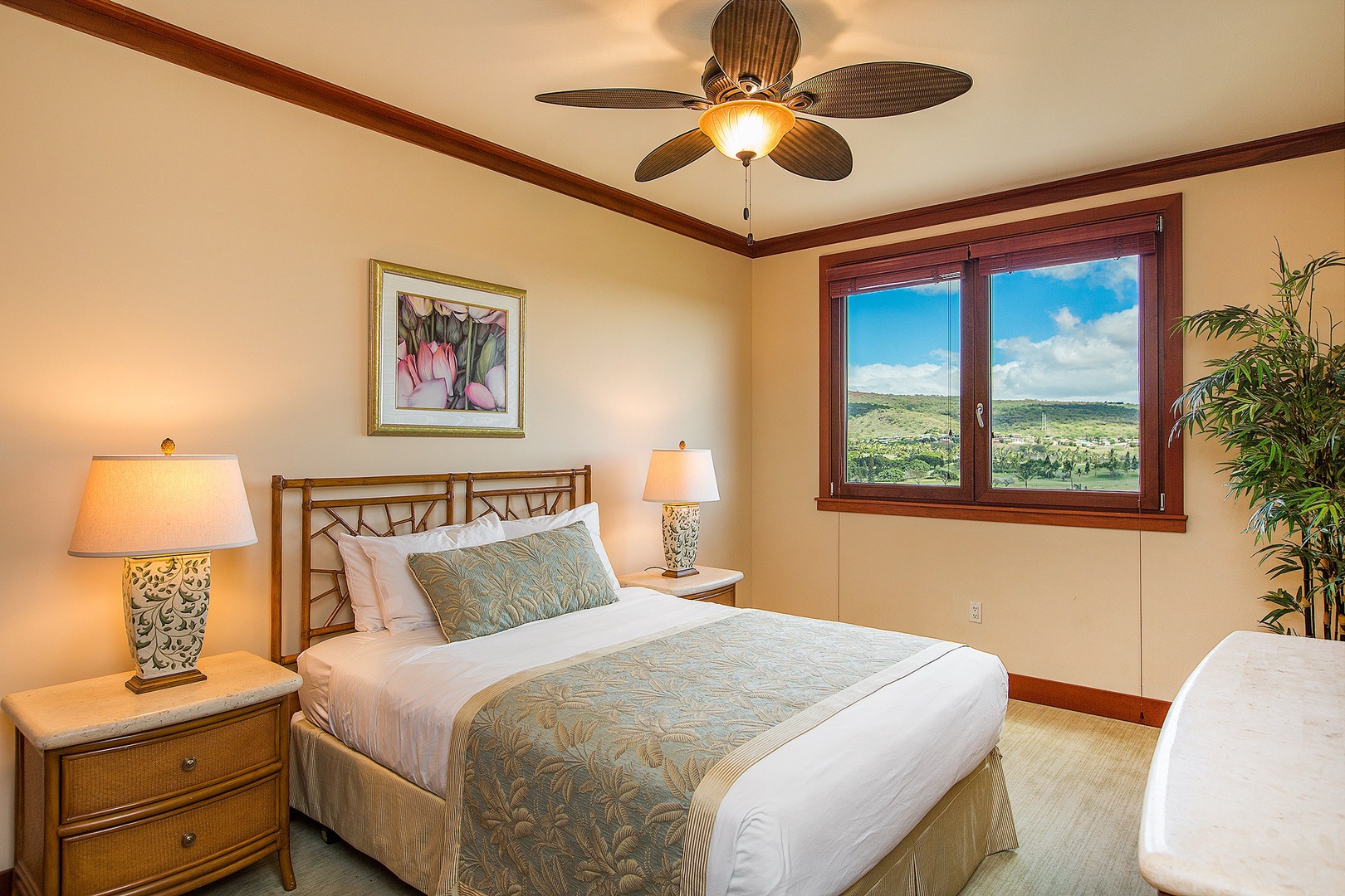 Bedroom 2 features a queen bed