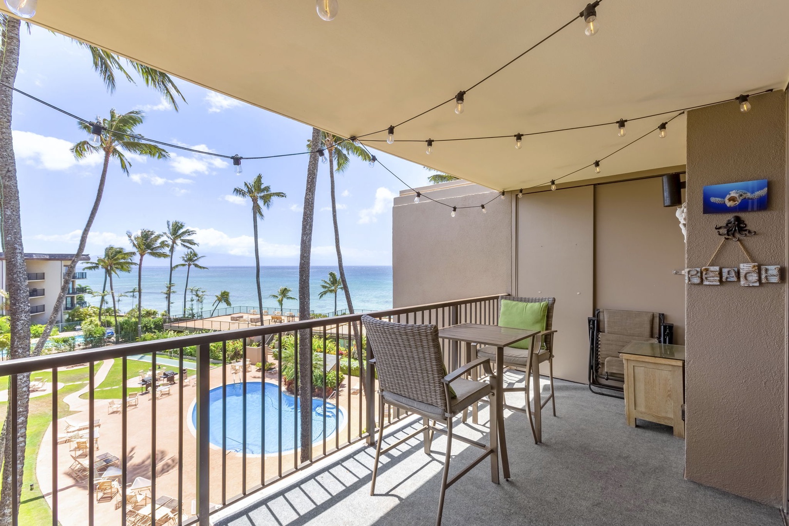 Private lanai with outdoor seating and stunning views