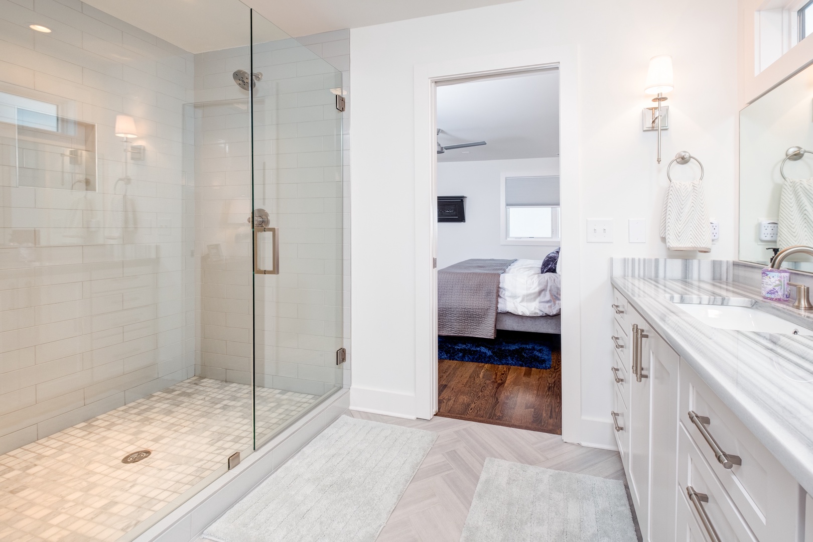 Master bedroom en suite with stand up shower, and dual sinks