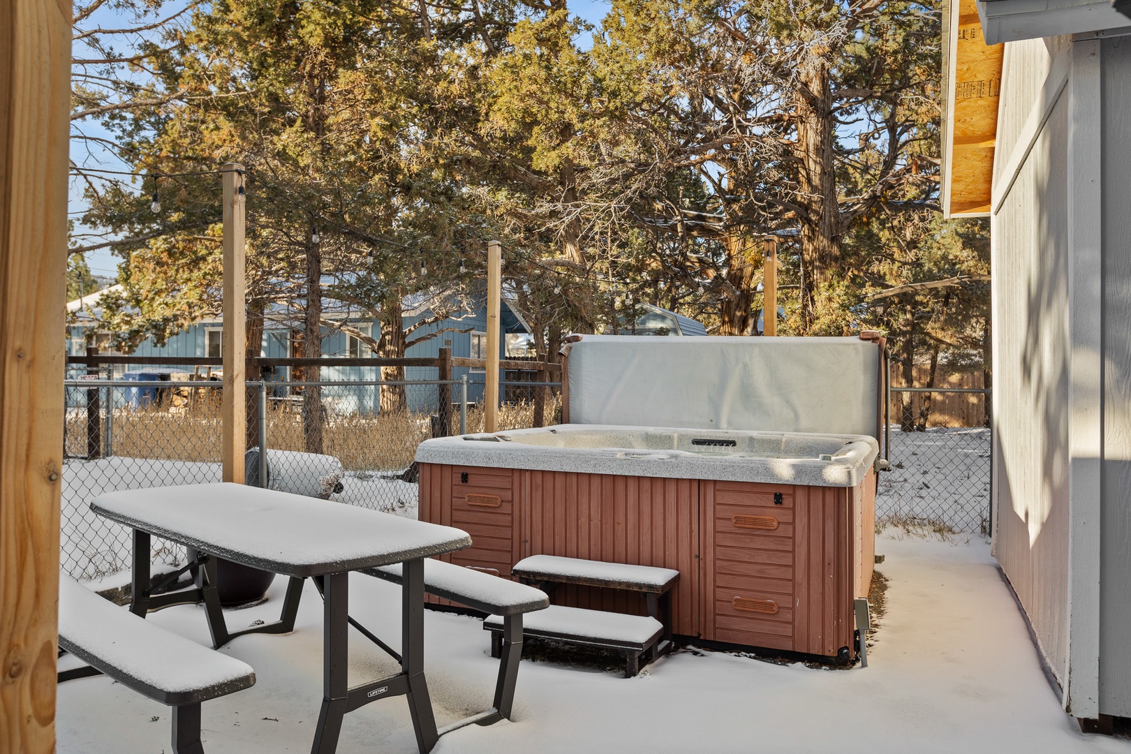 Hot Tub with outdoor seating during the winter