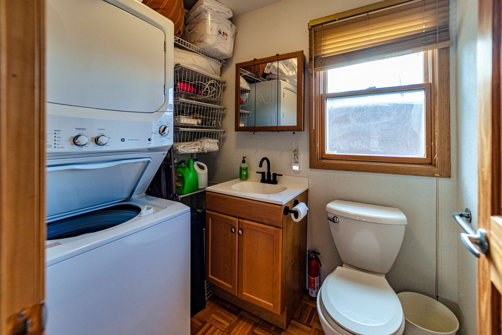 A convenient half bath with laundry is available off the main living area