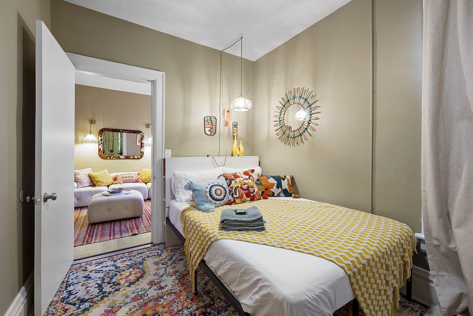 The second bedroom boasts a plush queen-sized bed