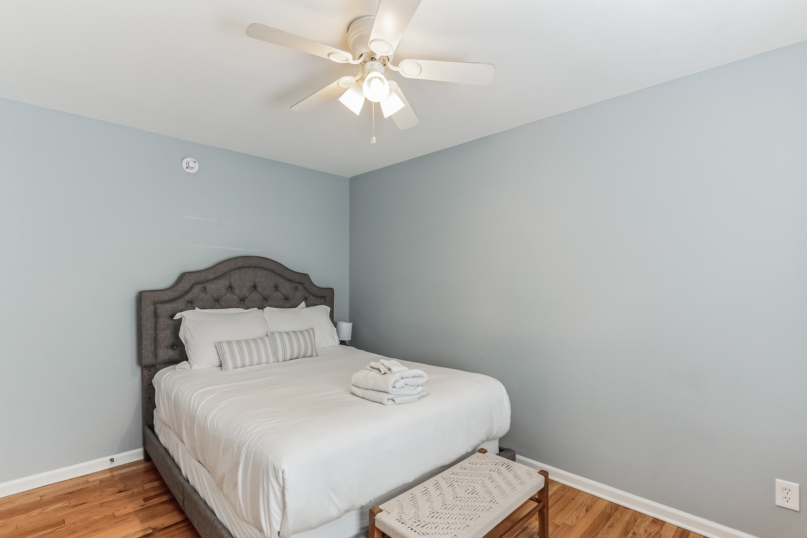 Relax in second bedroom, featuring a queen size bed, TV & closet