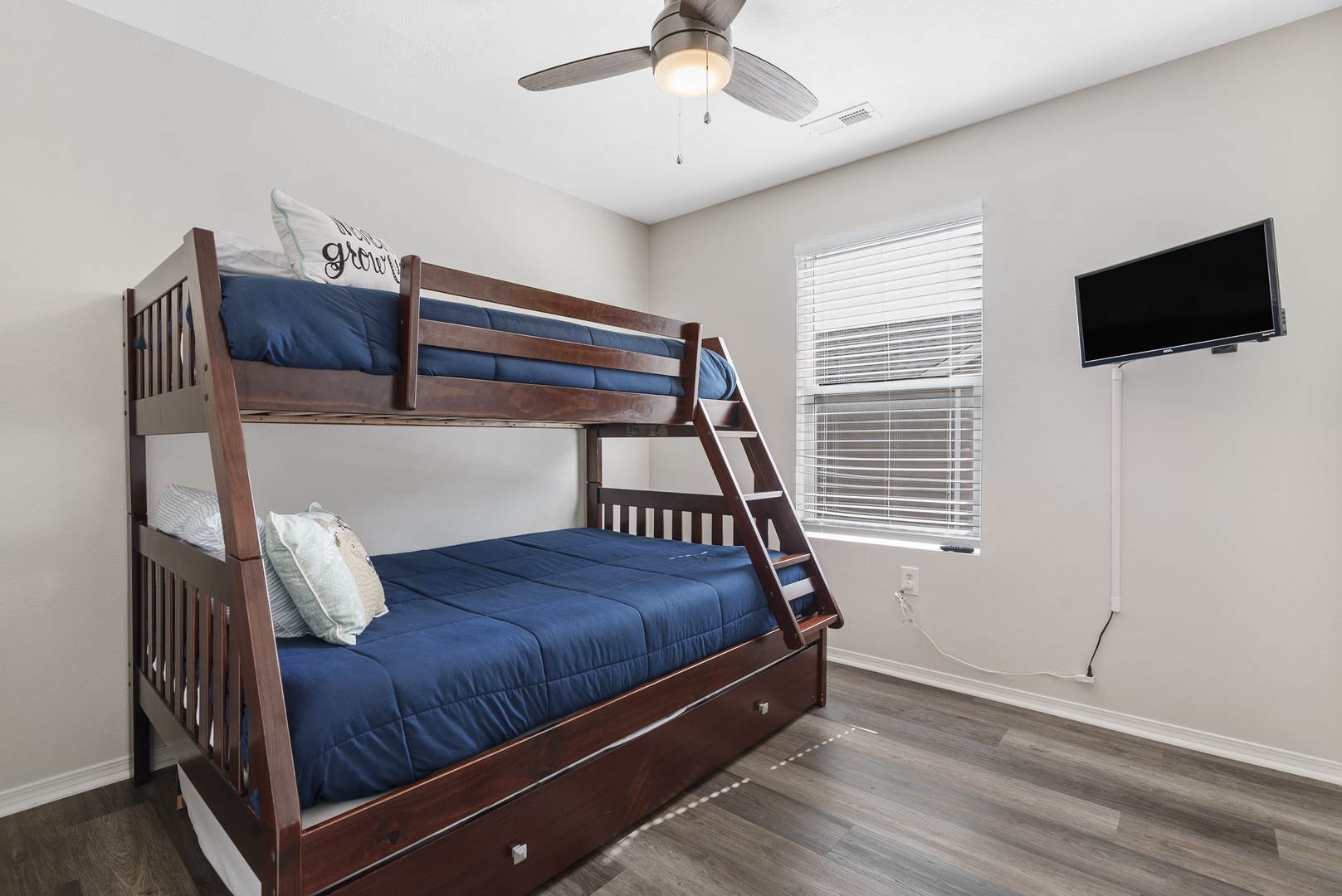 Bedroom 2 with Twin/Queen bunk bed, Twin Trundle, and Smart TV