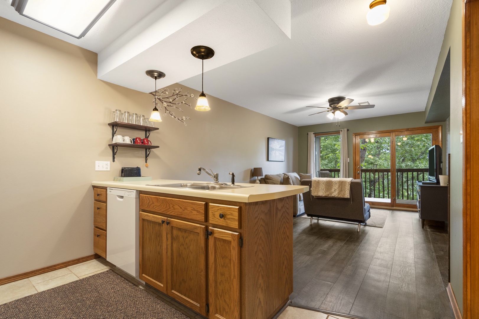 The open, airy kitchen offers ample space & all the comforts of home