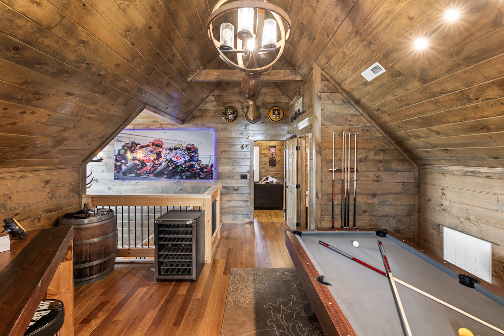 Enjoy a round of pool or relax at the bar with a cocktail in the upper-level loft