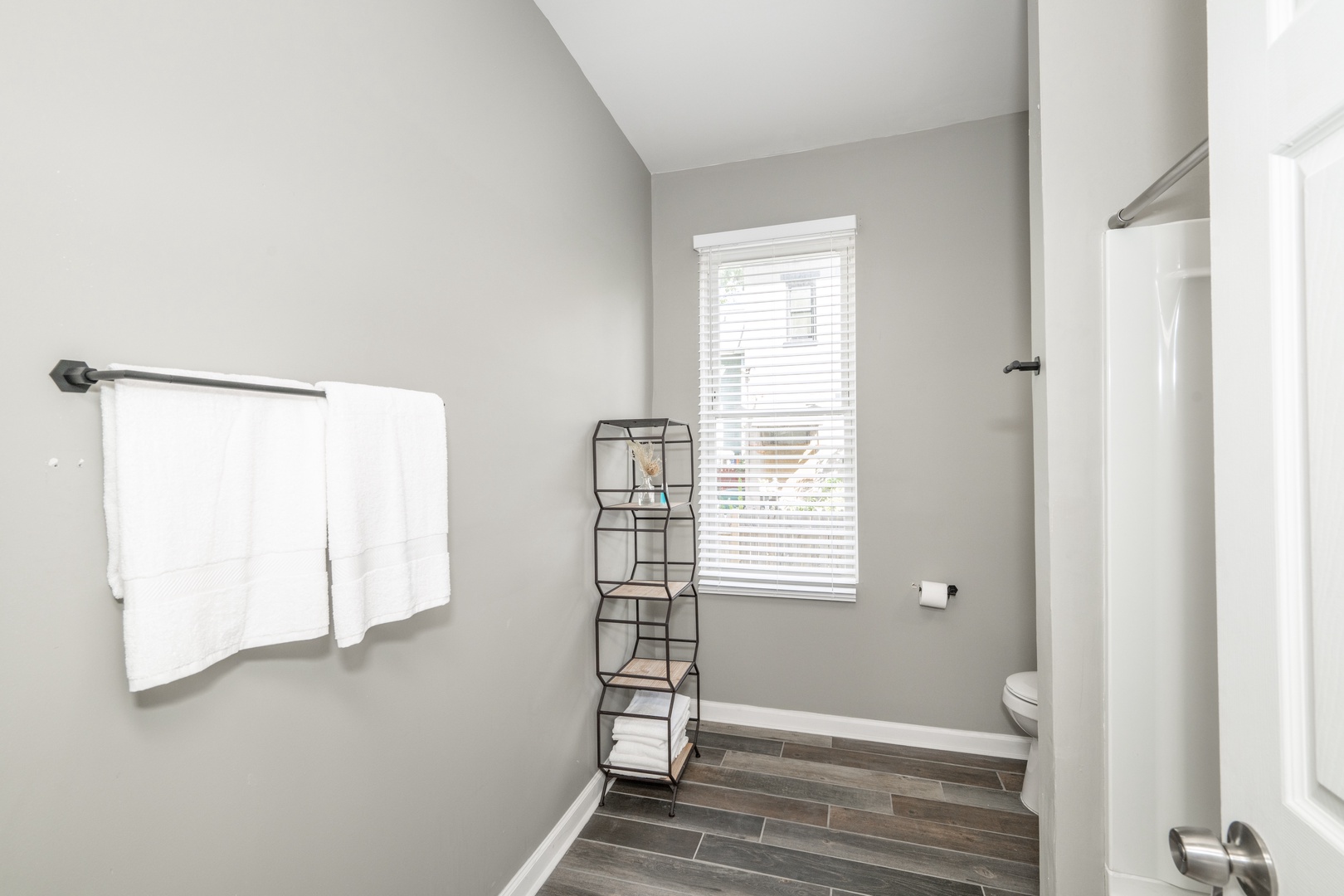 The 1st floor full bathroom offers a single vanity & shower/tub combo