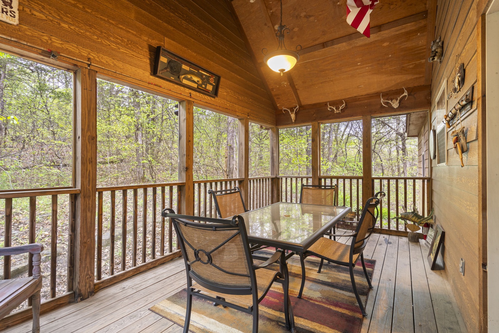 Enjoy alfresco dining or lounge the day away on the screened deck