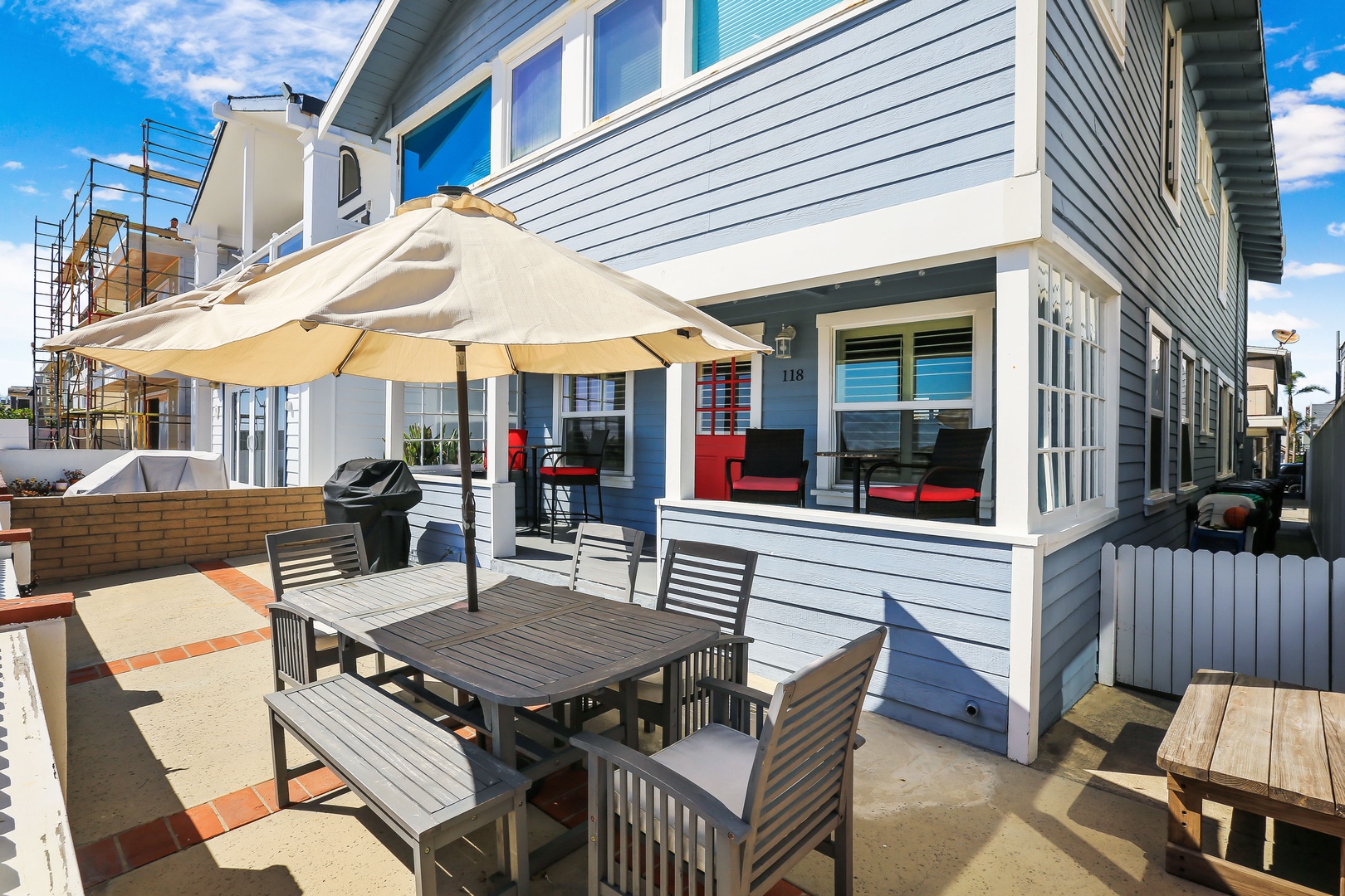 Outdoor dining with ample seating and gas BBQ grill