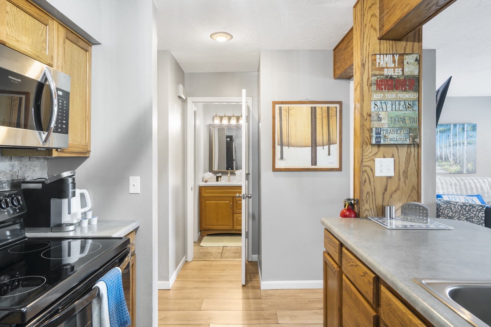 The open, airy kitchen offers ample space & every home comfort