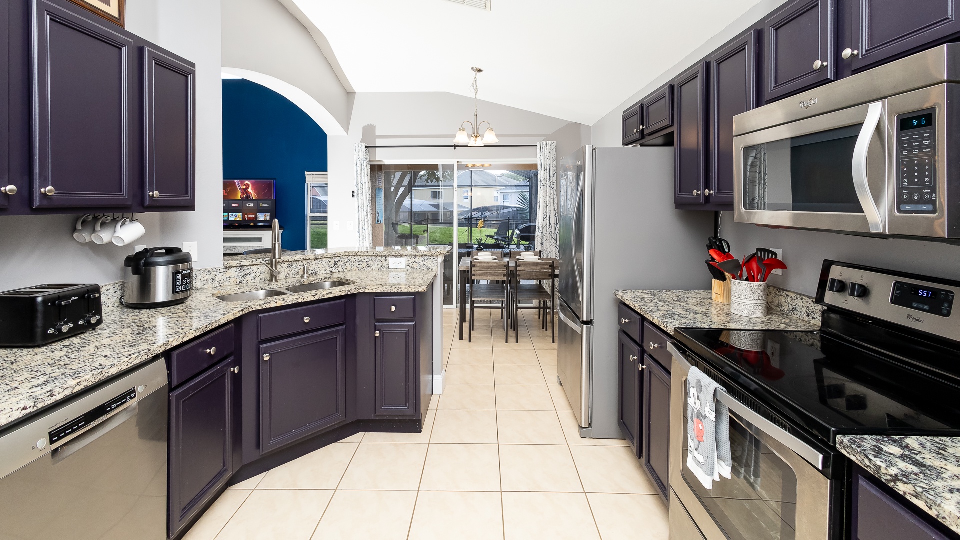 The open, airy kitchen offers ample space & all the comforts of home