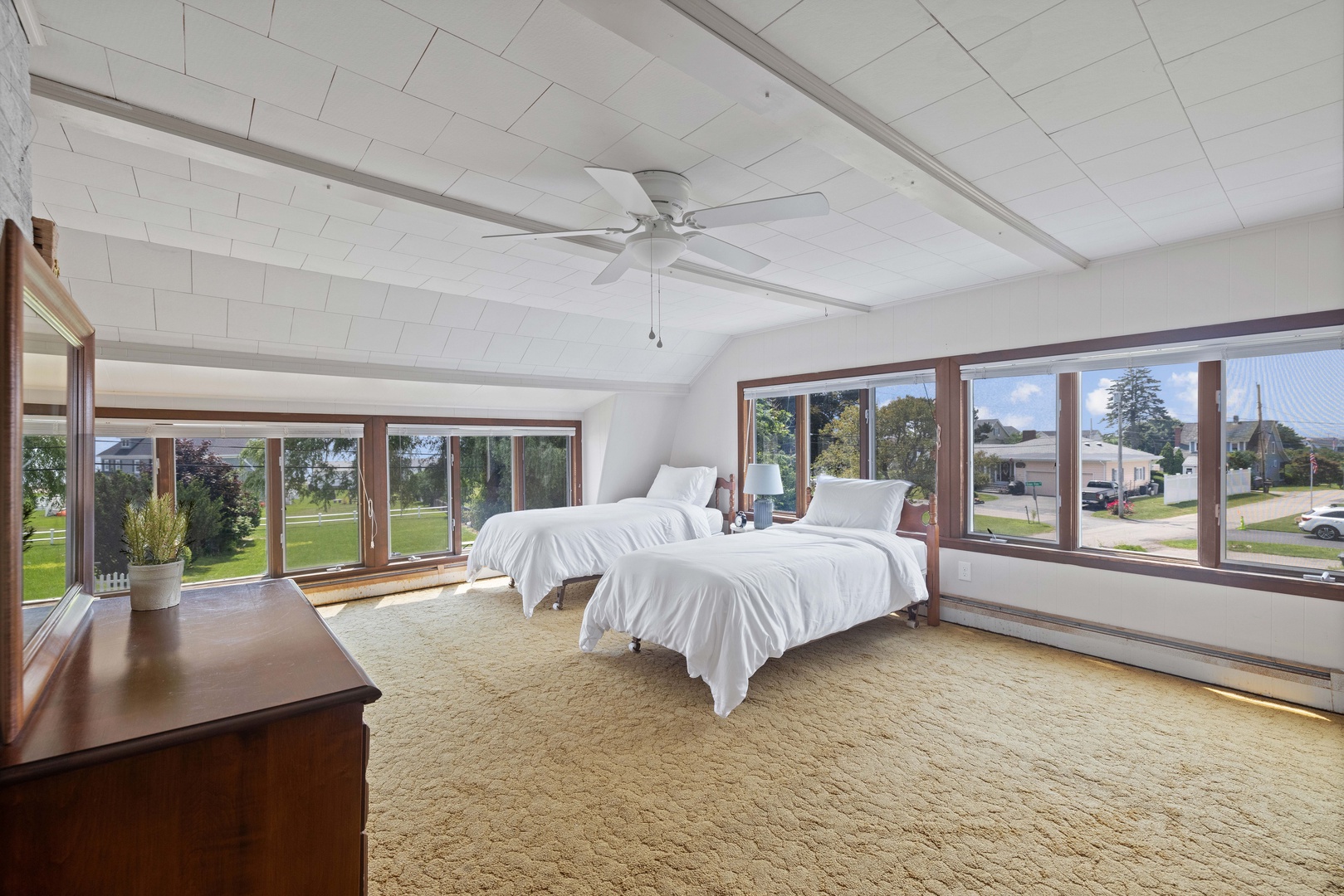 The 2nd bedroom, with a full-sized bed, a pair of twin beds, & twin-over-twin bunks