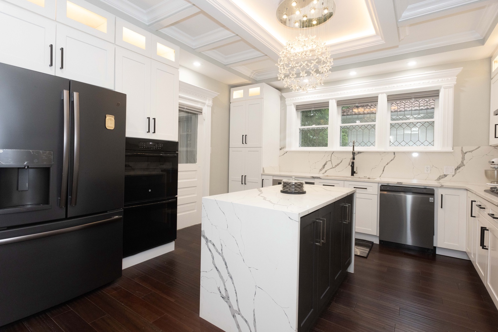 The stunning gourmet kitchen offers ample space & all the comforts of home