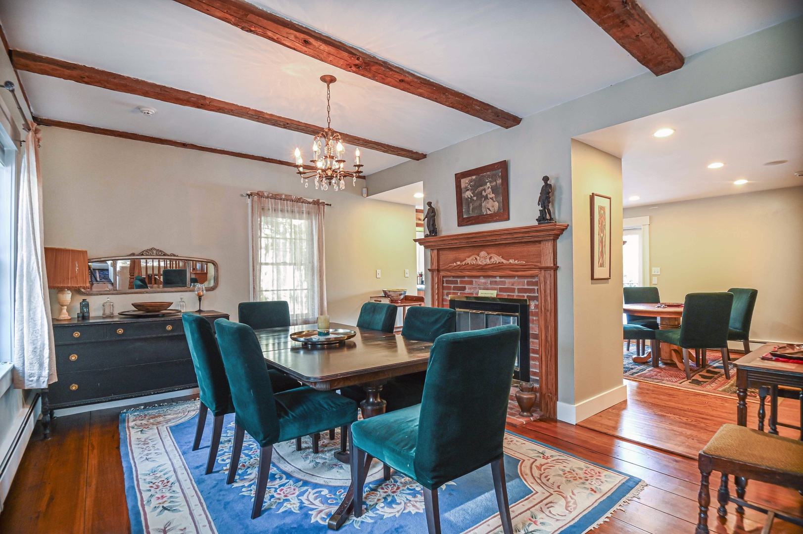 Gather for elegant meals together in the dining room, offering seating for 6