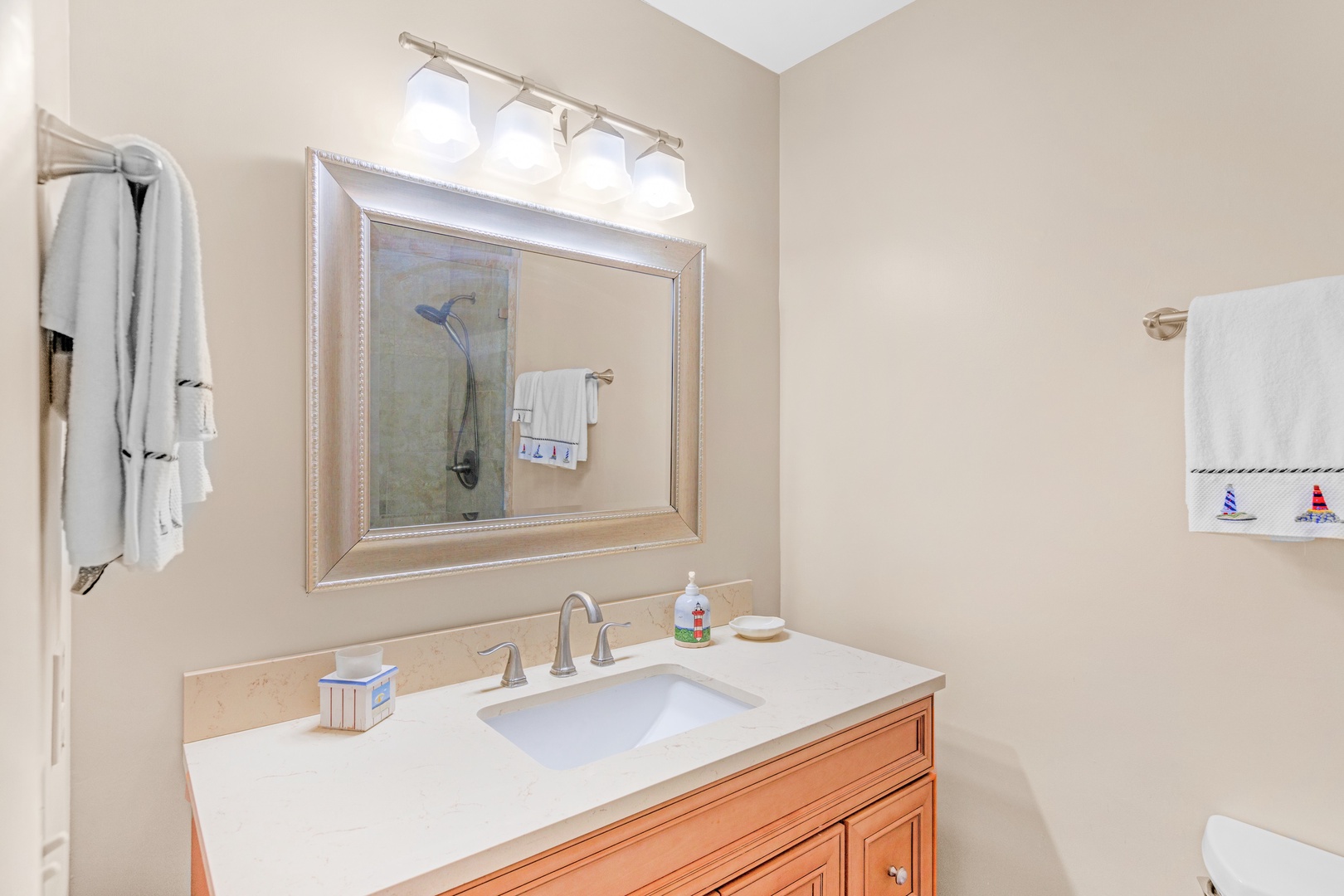 The private king ensuite offers a single vanity & shower