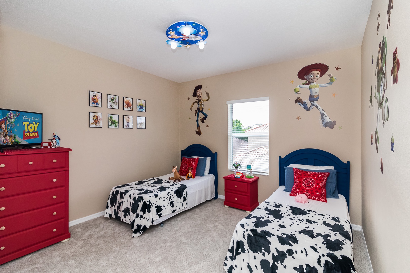 Bedroom 5 Toy Story themed with 2 Twin beds, and TV (2nd floor)