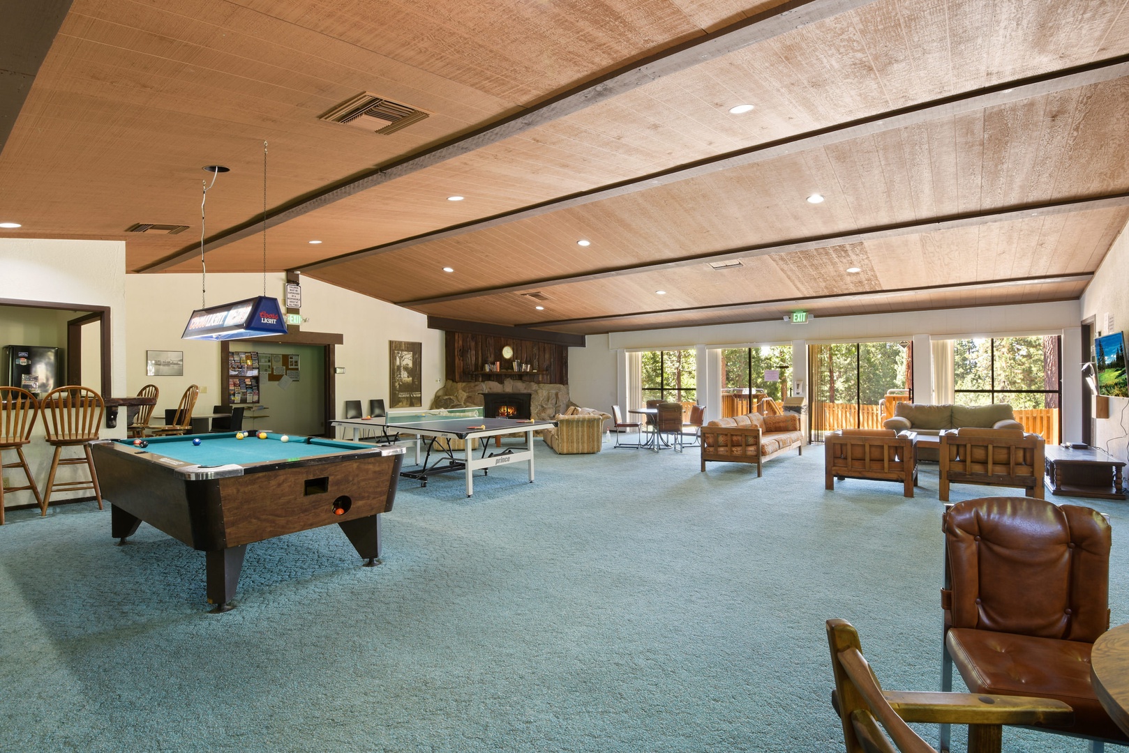 Condo clubhouse with pool table and ping pong table