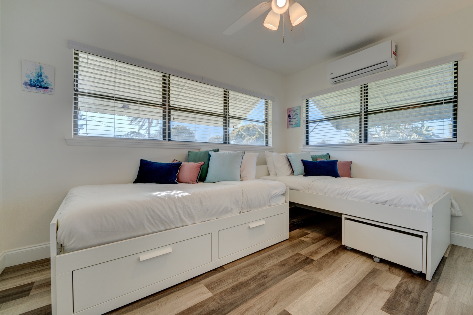 Double twin bedroom (optional king bed conversion) features a smart TV & a ceiling fan